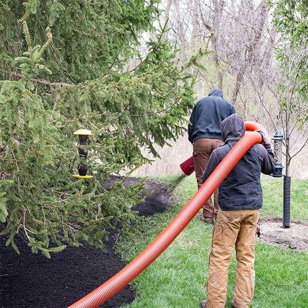 mulch blowing can effectively mitigate erosion issues on sloped terrain by providing a protective layer of mulch